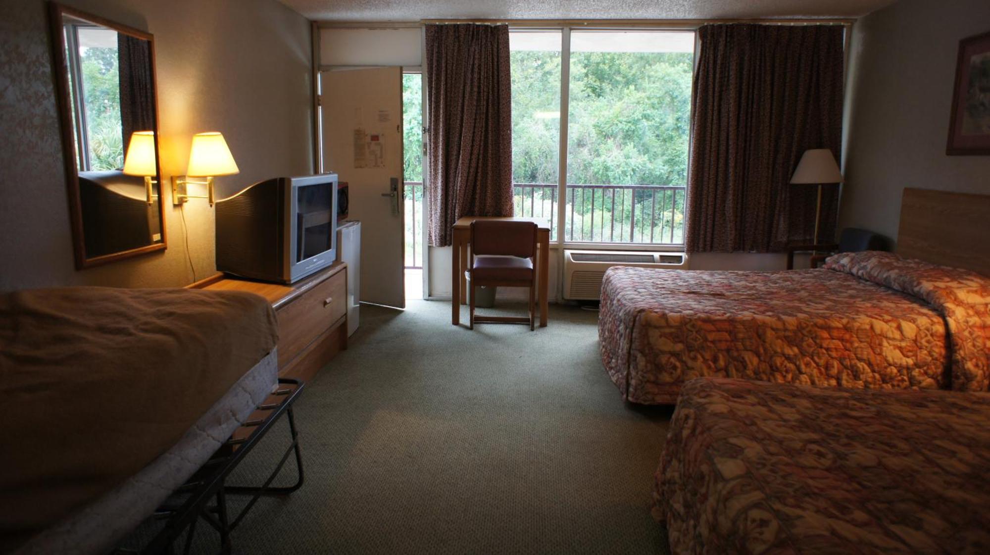 أورانج Executive Inn & Suites الغرفة الصورة