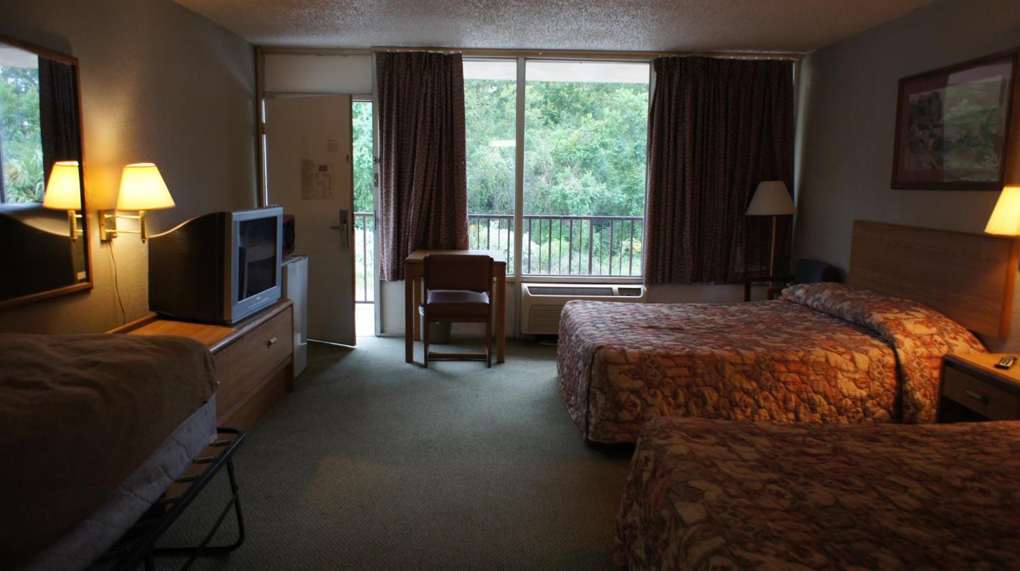 أورانج Executive Inn & Suites الغرفة الصورة